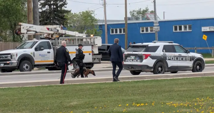 Suspect in hospital after exchanging gunfire with Winnipeg police, taking 3 hostages