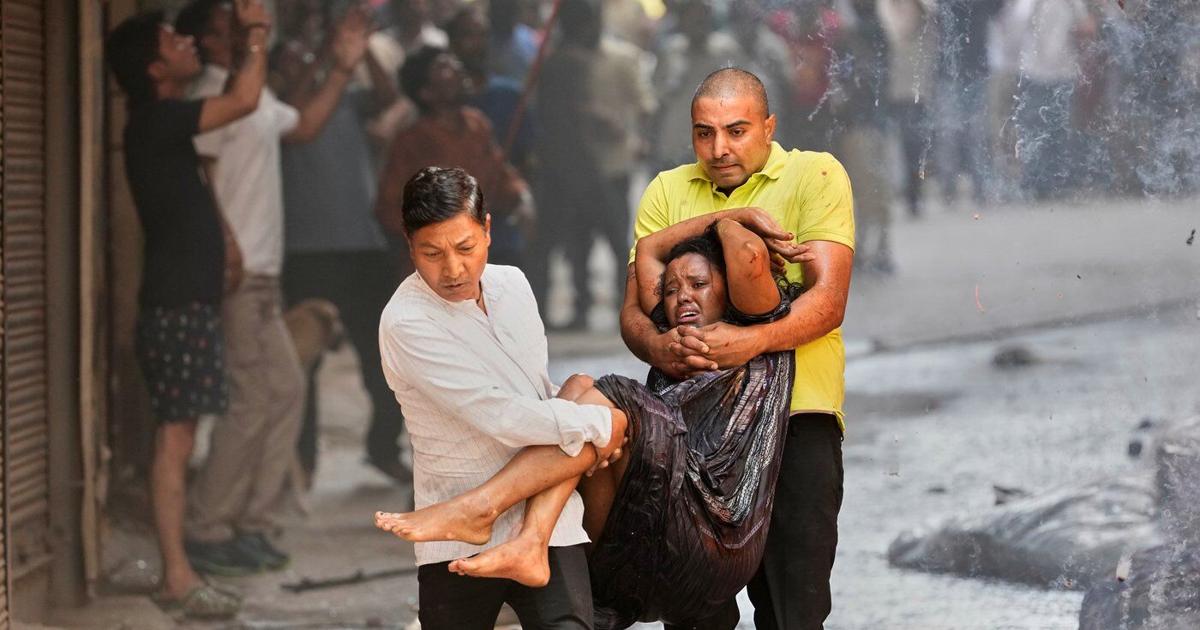 Photos show a rescue operation in a New Delhi hotel fire