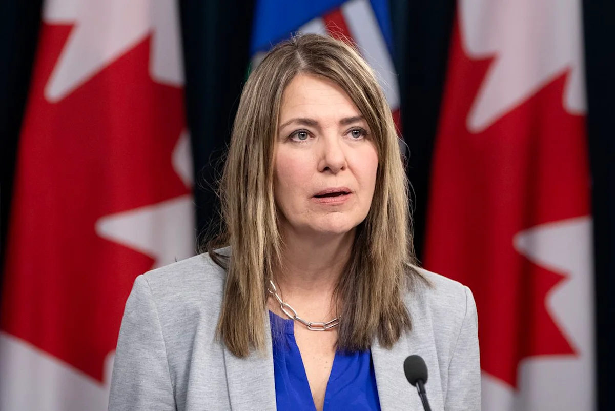 Premier Danielle Smith defends AISH changes, ADAP implementation