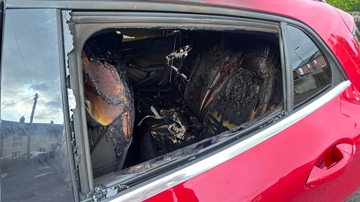 Car burnt out in 'racially