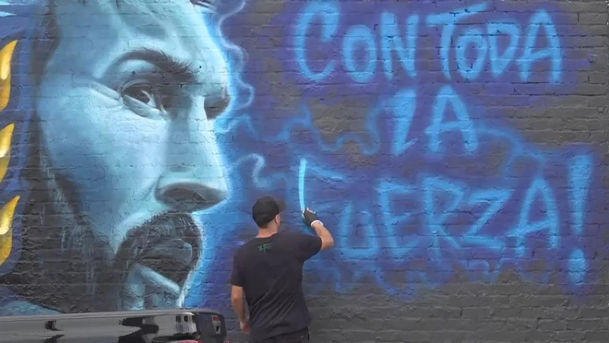 Artist paints large Lionel Messi mural in Dallas