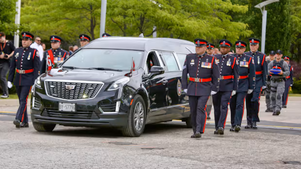 'The man who was loved by all': Funeral service honours Toronto police officer killed during investigation