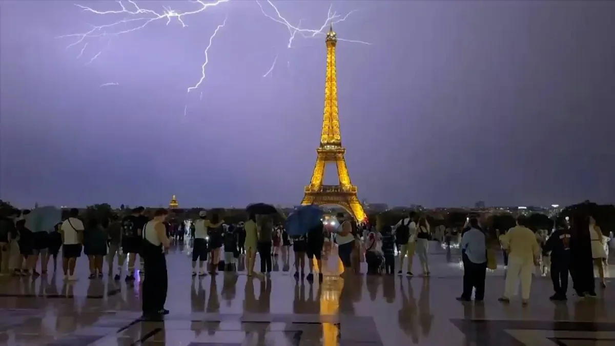 Lightning strikes Eiffel Tower as thunderstorm rages over Paris