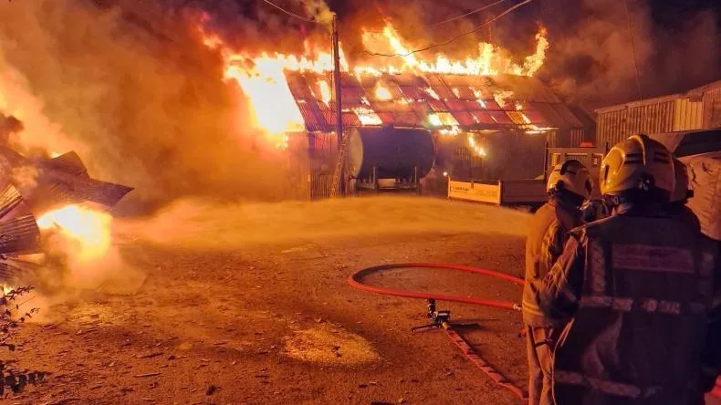 Twelve crews fight fire at industrial units