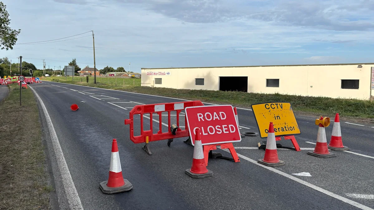 Melted road to remain closed after repair delays