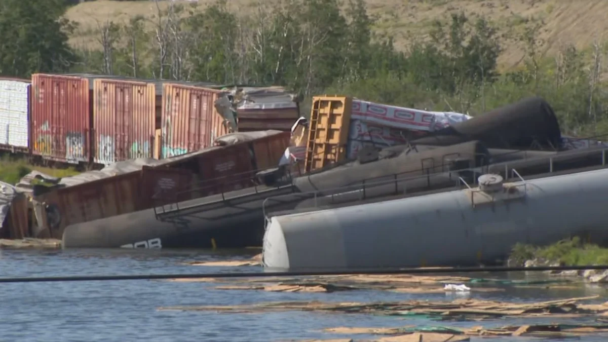 Train derailment sends multiple railcars into southwest Calgary wetland