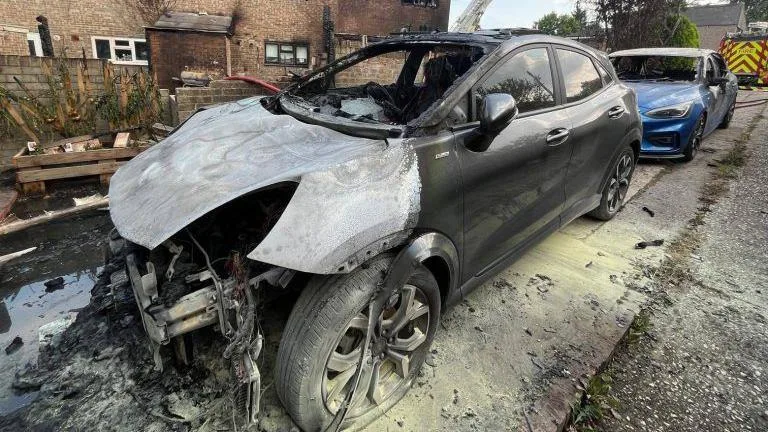 Garden shed fire spreads to houses and cars