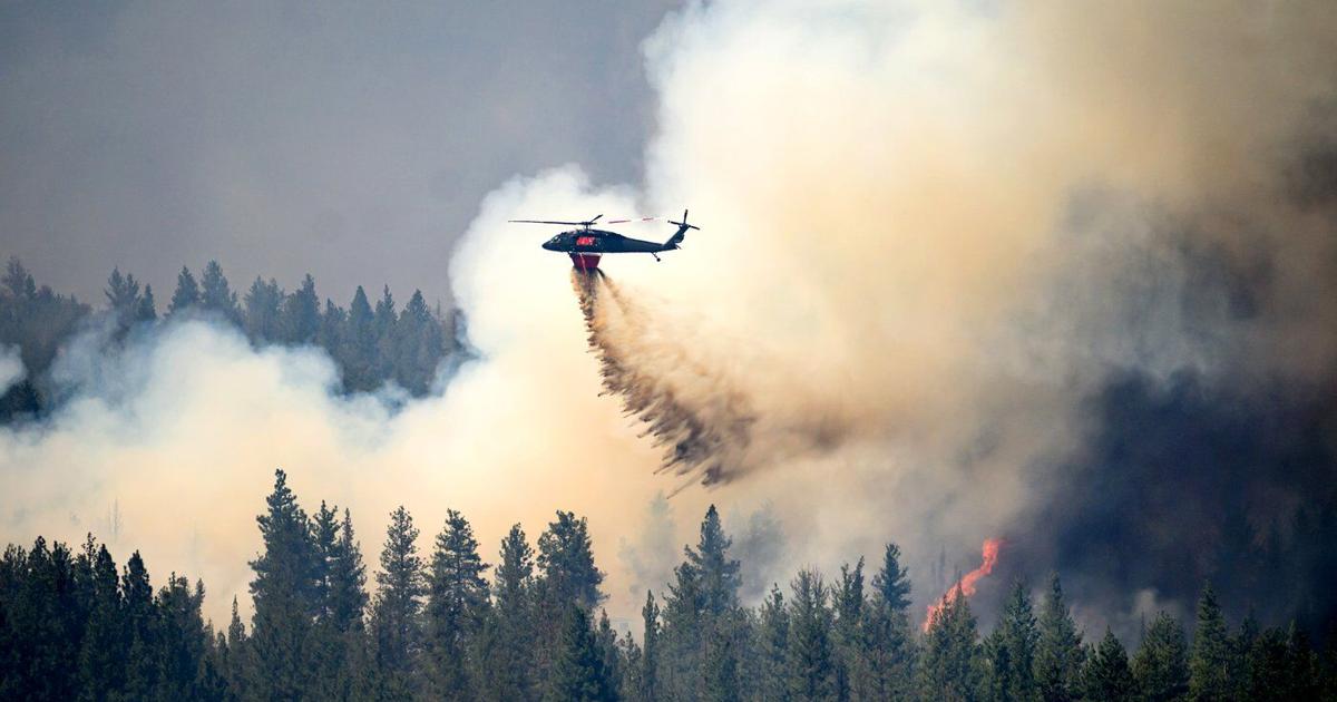 Oregon firefighters brace for windy and hot weather as they battle dozens of blazes