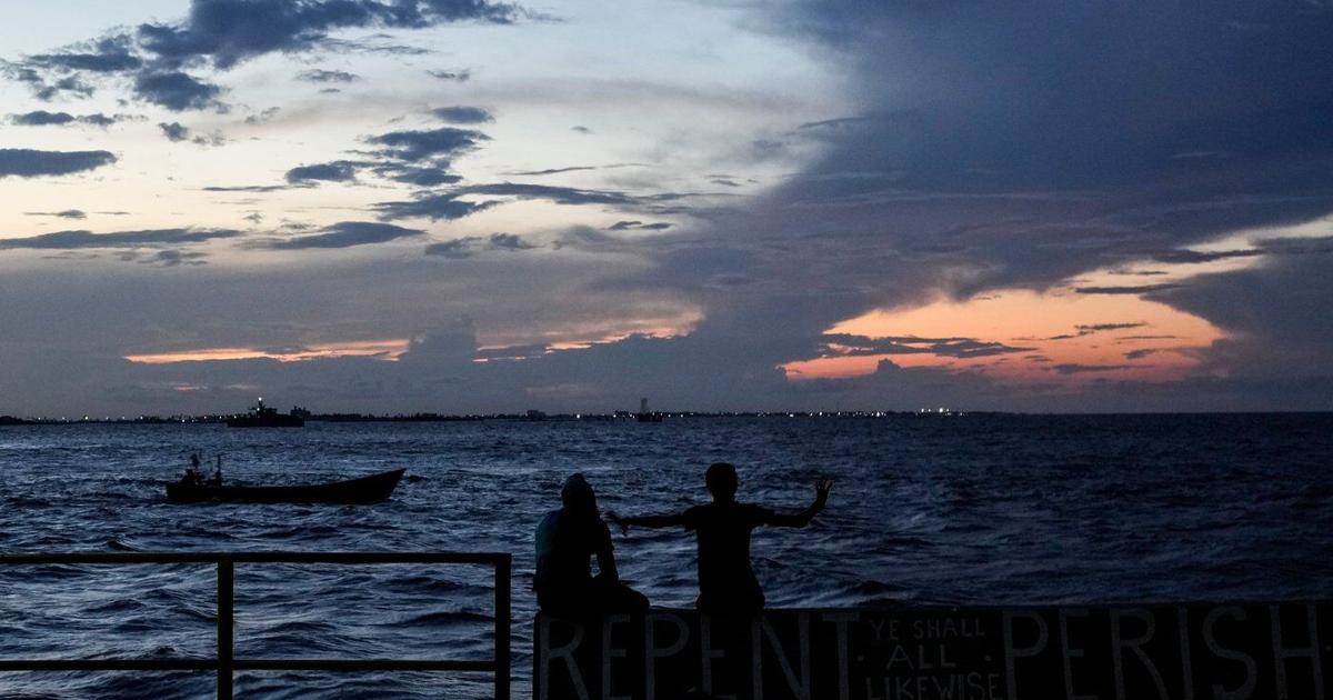Guyana appoints experts tasked with investigating ferry capsizing that killed dozens