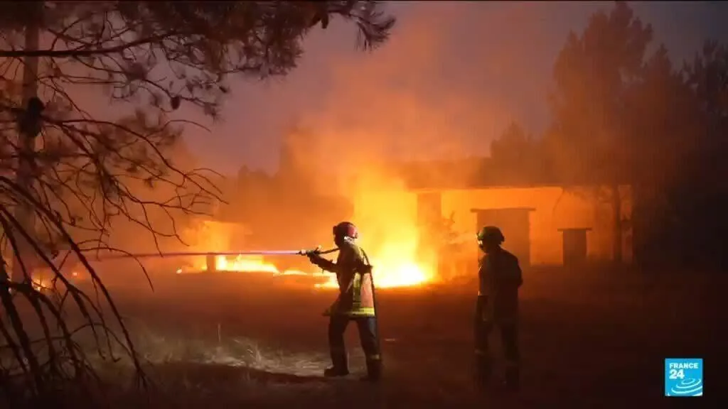 French firefighters work tirelessly to stop blaze from spreading