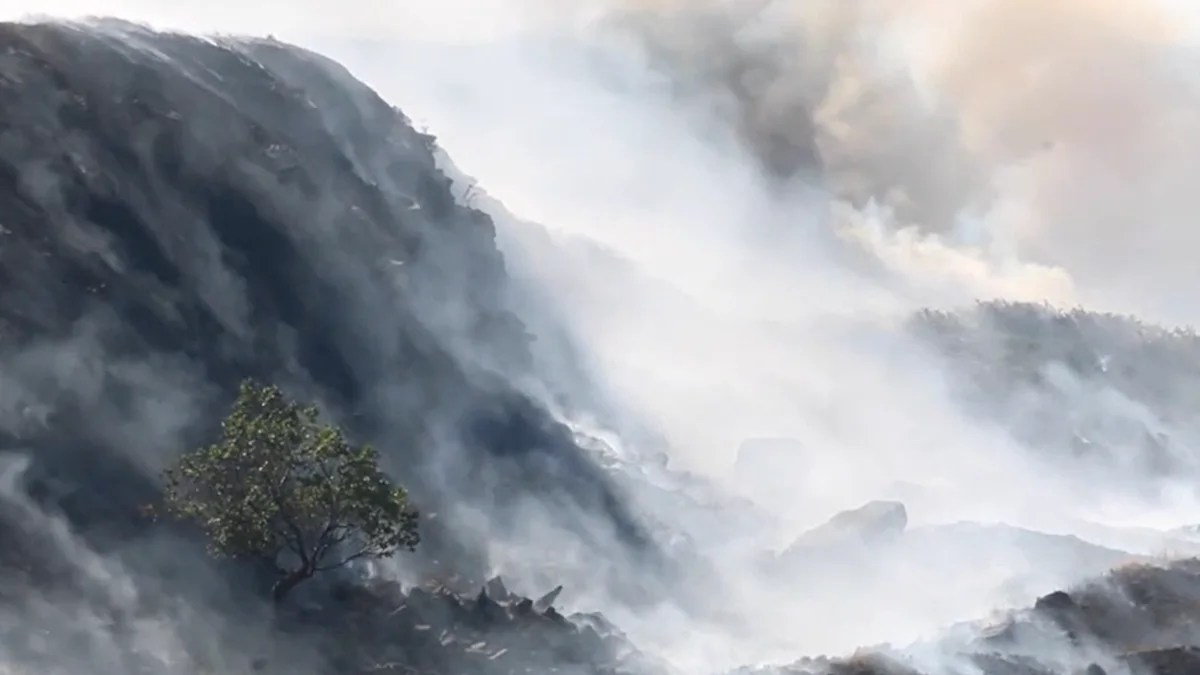 Wildfires still burning after more than two weeks