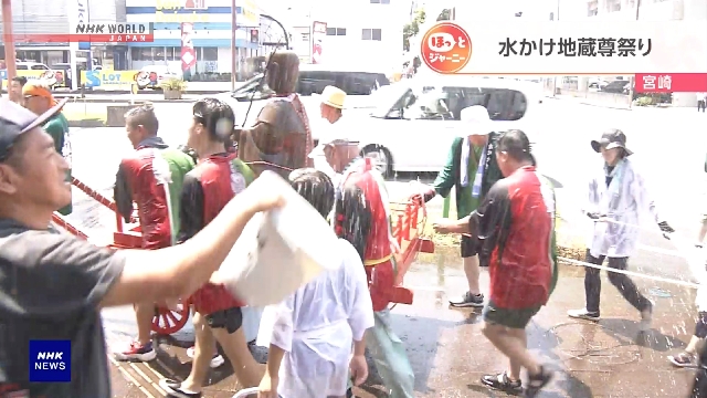 Children cool down at festival in southwestern Japan