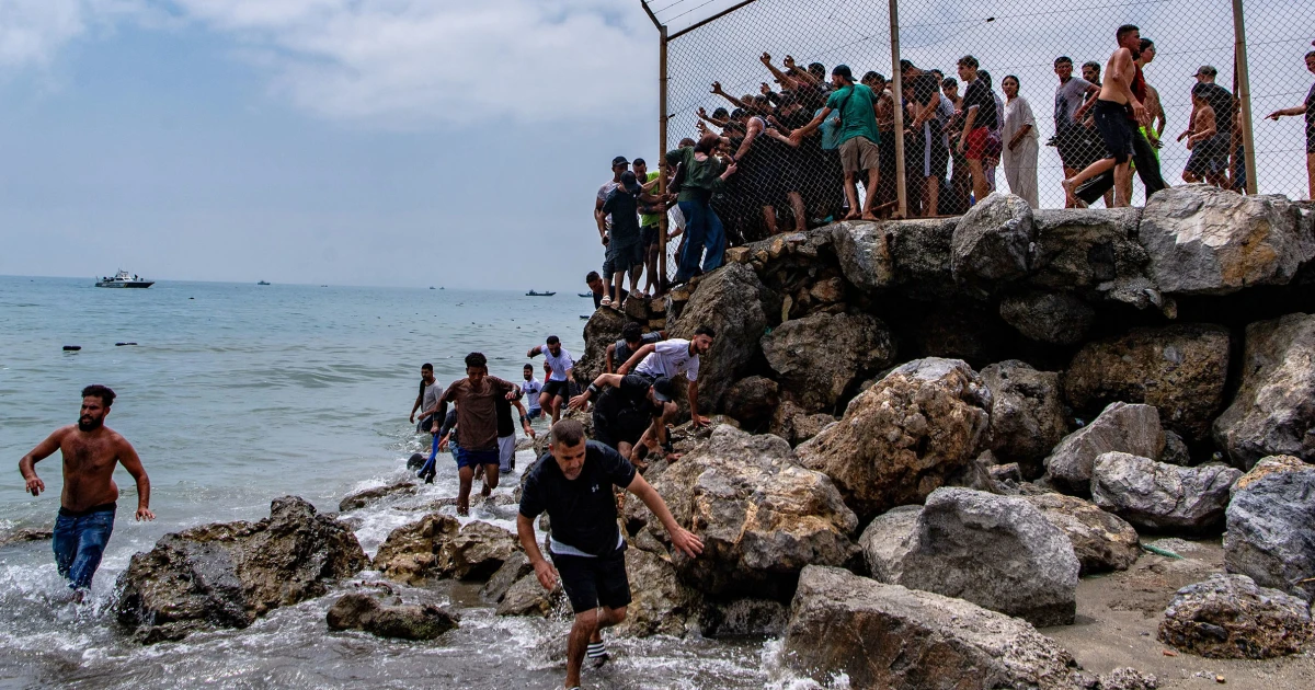 50,000 cross into Spanish territory in deadly rush across border from Morocco