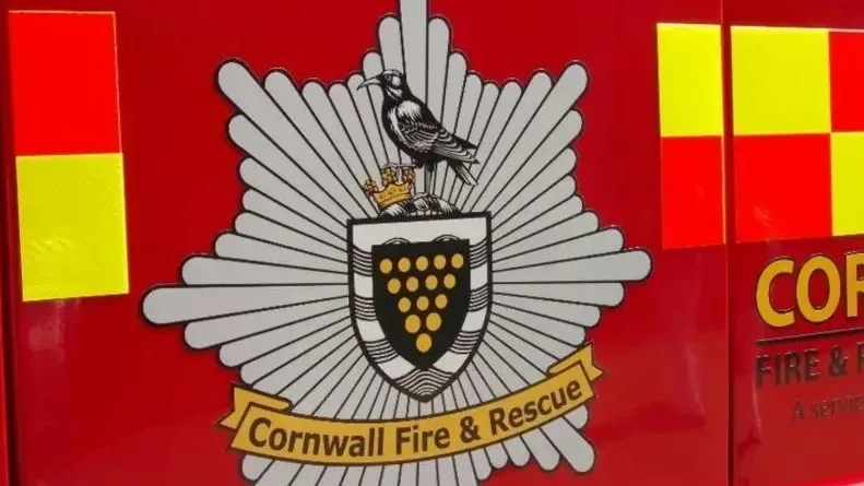 Firefighters tackling large fire near road