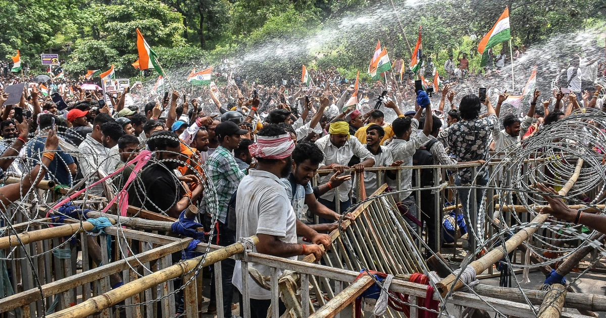 Indian police use tear gas and batons to disperse youth protest over exam paper leaks