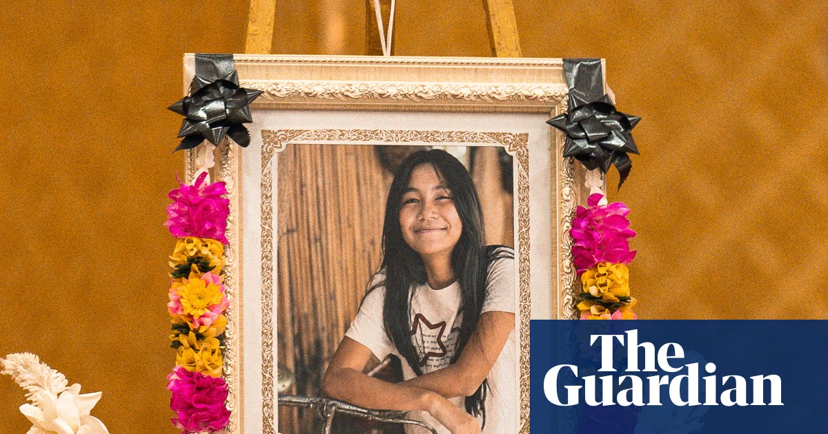 At a temple in Thailand, parents mourn a 12-year