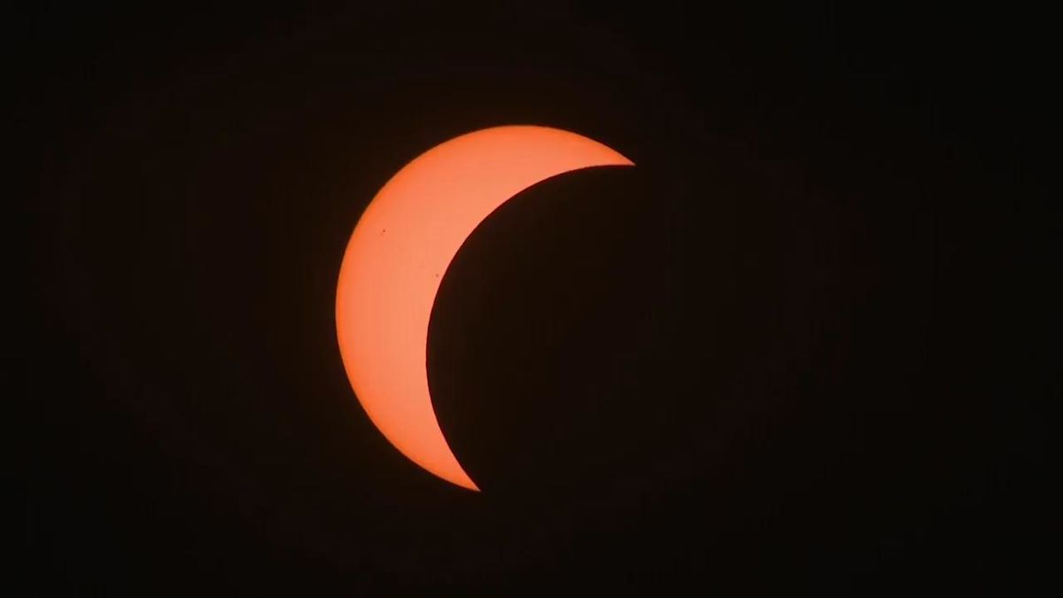 People around the world gather to witness solar eclipse