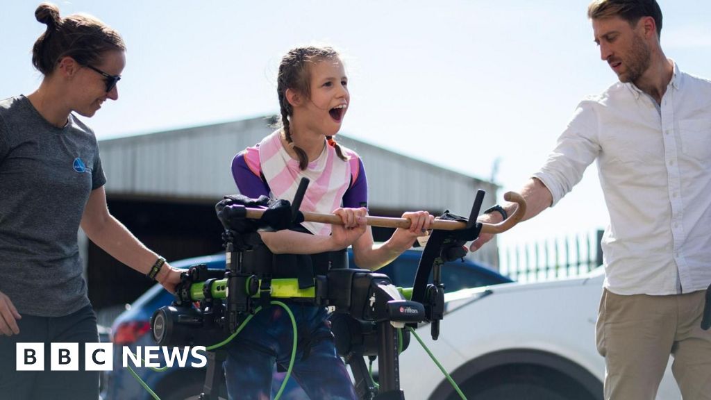 Sketty teen with cerebral palsy walks for first time with exoskeleton