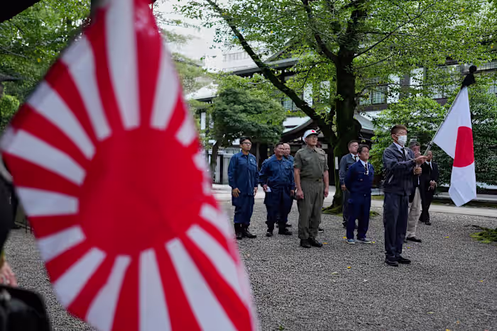 Japan's defense chief visits shrine neighbors see as symbol of Japanese militarism