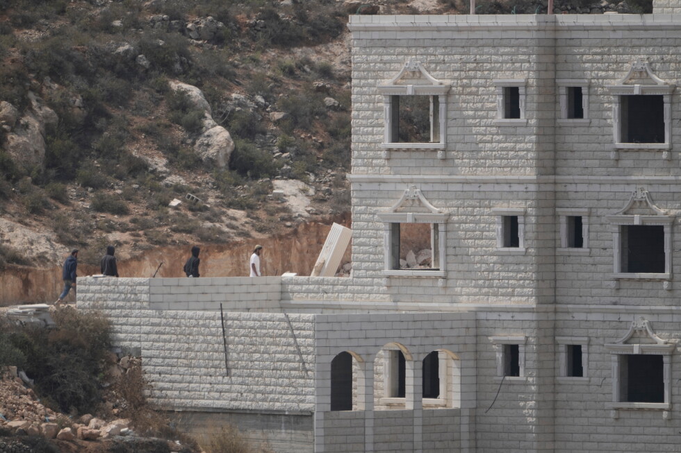 Iran's leader calls for Muslim unity, NBC crew attacked in West Bank and other Mideast news