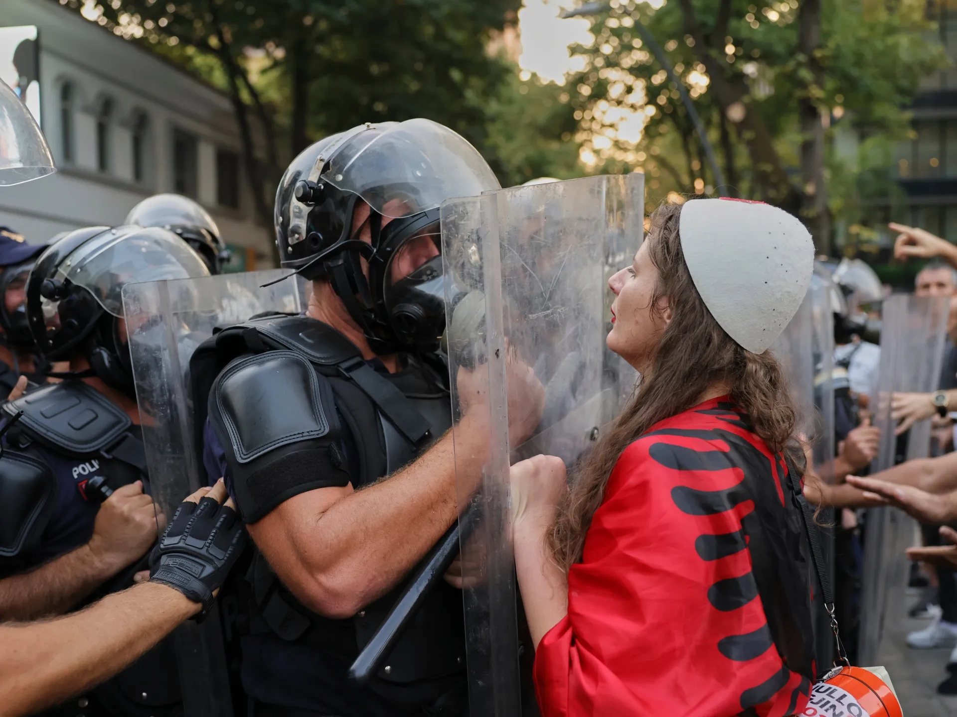Protesters, police clash in Albania over Trump