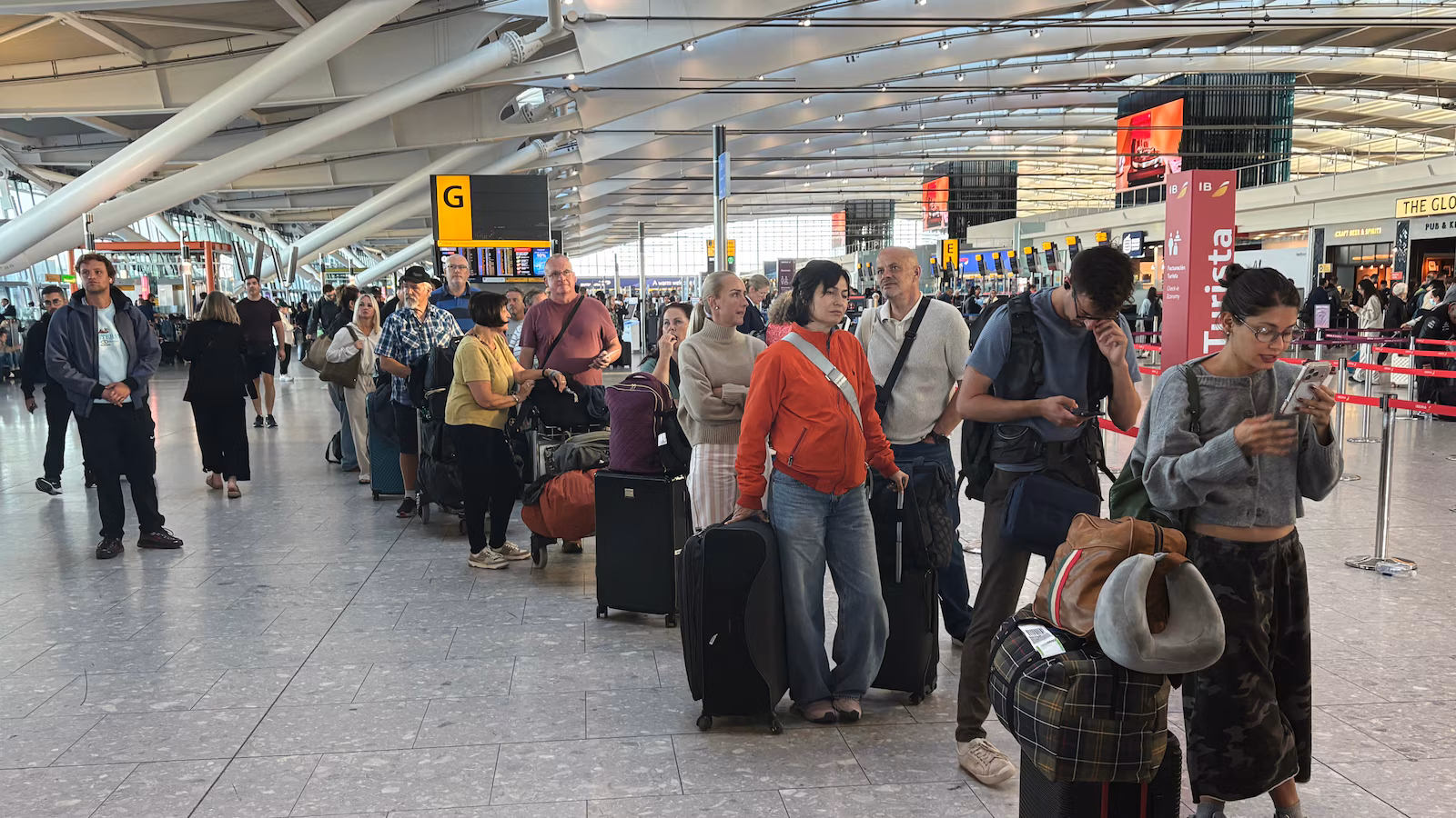Airlines scramble to dig out from tech problems that canceled 1,750 flights in the UK