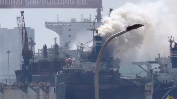 Ship fire at Chinese port leaves 25 dead | CBC News