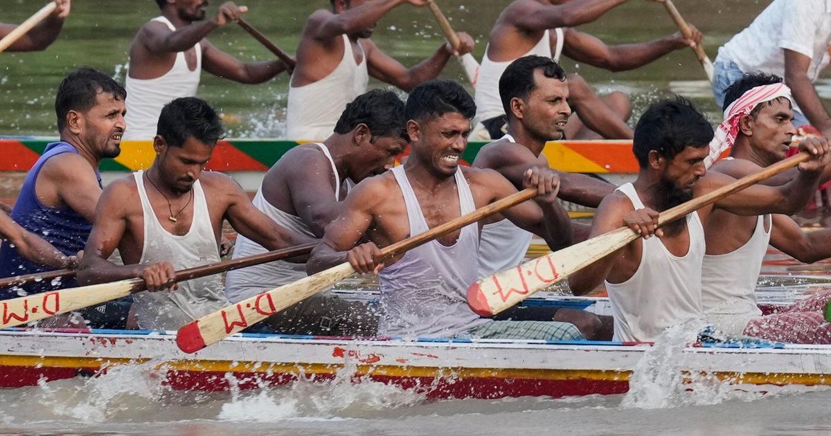 Photos of a boat race on India’s Kulsi River