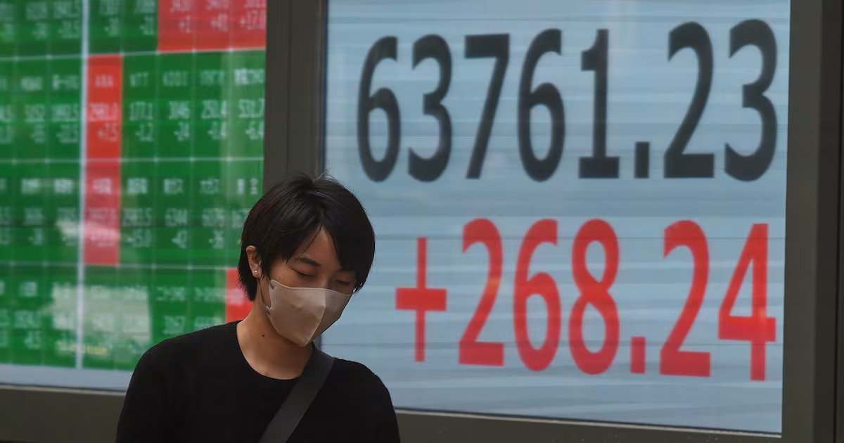 World shares advance and oil prices fall as worries over inflation ease