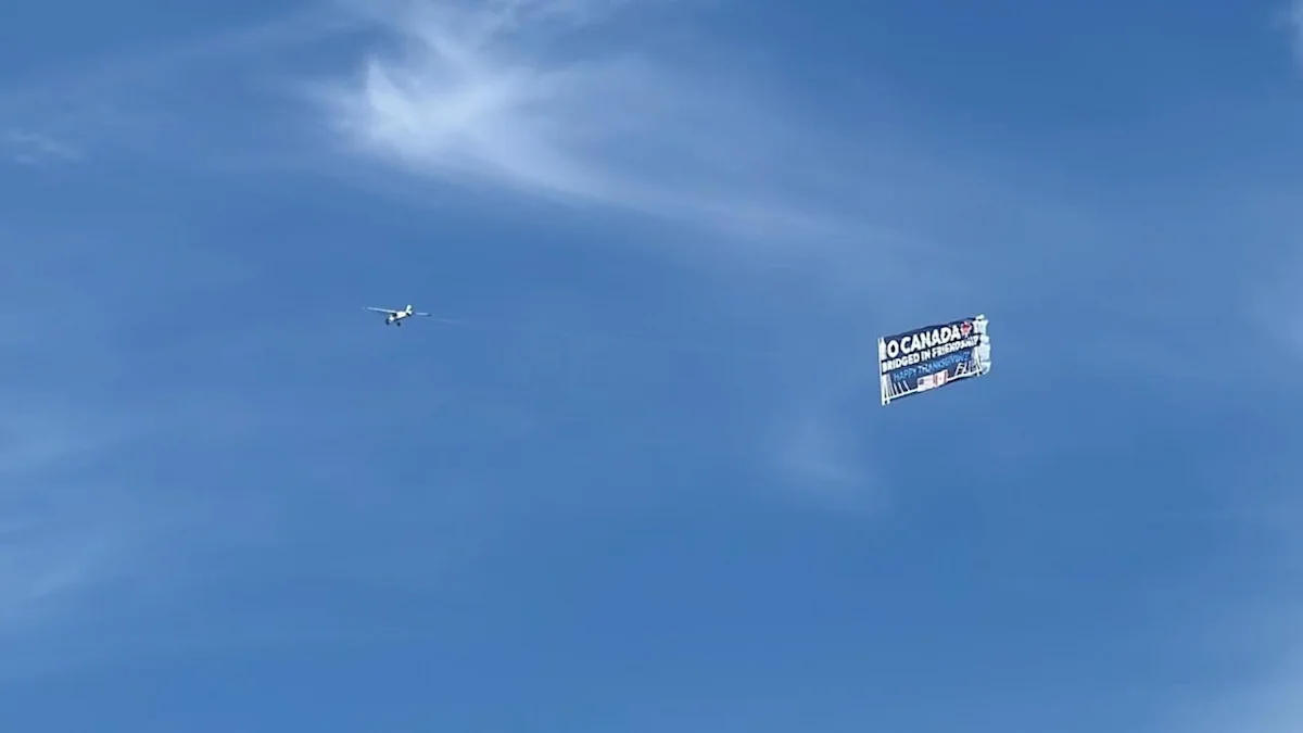 Here's why this Thanksgiving banner flew over the Detroit River