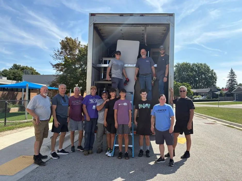 St. Clair Catholic makes donation to Canadian Food for Children