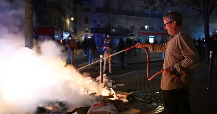 Macron condemns rioting during nationwide day of protests